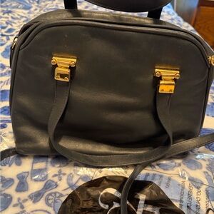 Black and Gold Decorative Home Accent Bag with Signature Design